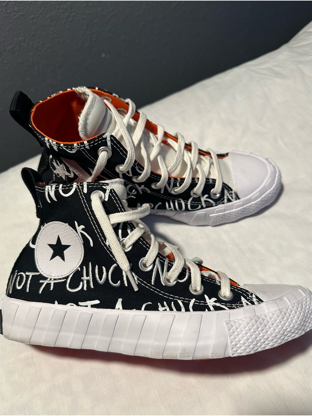 Converse NOT A CHUCK Black Canvas Sneakers with Bright Orange Lining kids Unixes